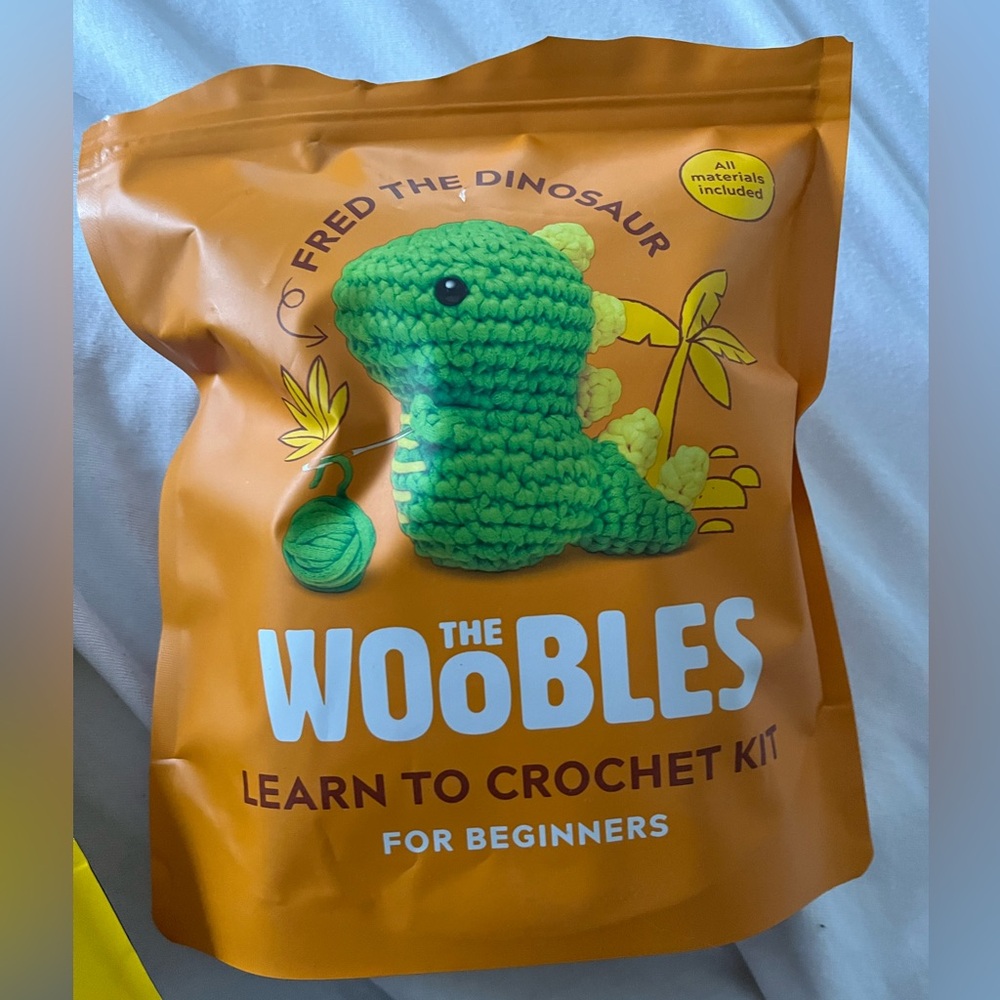 Opened but not used. Woobles Green Dinosaur